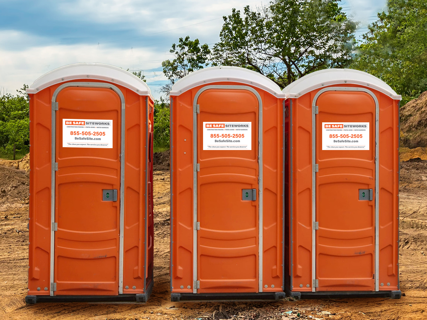 three be safe siteworks porta-johns on a construction site