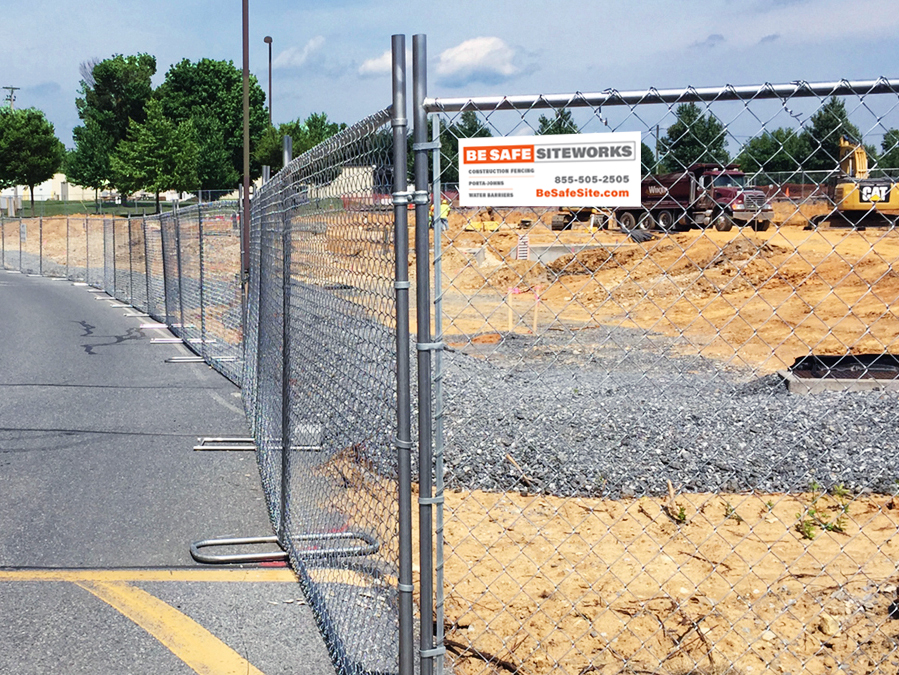 large construction site enclosed in Be Safe Siteworks panel fencing